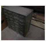 Metal parts organizer filled with h...