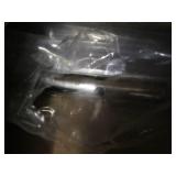 Silver trimmed glass shower door...