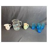 Mixed Set of Pitchers and Blue Glass Tumblers Including Pfaltzgraff and Nemadji Pottery