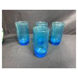 Mixed Set of Pitchers and Blue Glass Tumblers Including Pfaltzgraff and Nemadji Pottery