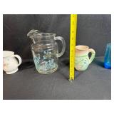 Mixed Set of Pitchers and Blue Glass Tumblers Including Pfaltzgraff and Nemadji Pottery
