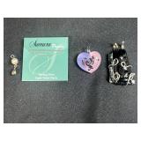 Assorted Jewelry Lot Including Sterling Silver Pearl Pendant, Heart Glass Pendant, and Black Artisan Pendant