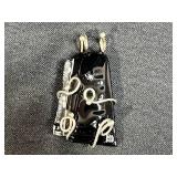 Assorted Jewelry Lot Including Sterling Silver Pearl Pendant, Heart Glass Pendant, and Black Artisan Pendant