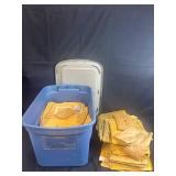 Collection of Used Padded Mailers in Storage Tote