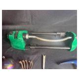 Mixed Lot: Terracotta Pots with Seashells, Hand Tools, and Sprinkler