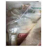 Box of Plastic Storage Bags and Round Paper Tags with Strings