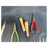 Collection of Hand Tools with Pliers, Files, Screwdrivers, and Magnifier