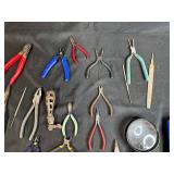 Collection of Hand Tools with Pliers, Files, Screwdrivers, and Magnifier
