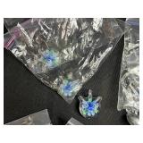 Collection of Glass Art Pendants with Floral and Heart Designs