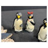 Vintage Penguin and Eskimo Figurines Lot with Decorative Ceramic Plate