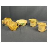 Collection of Vintage Stoneware Creamers, Teapot, and Advertising Bowls