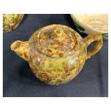 Collection of Vintage Stoneware Creamers, Teapot, and Advertising Bowls