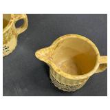 Collection of Vintage Stoneware Creamers, Teapot, and Advertising Bowls