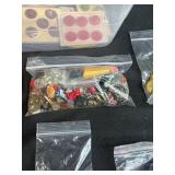 Collection of Vintage and Assorted Buttons in Plastic Bin
