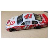 Racing Champions Mint Die Cast Collectibles including 1937 Ford Convertible, Cheerios #43 Pontiac, and Target #41 Dodge