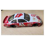Racing Champions Mint Die Cast Collectibles including 1937 Ford Convertible, Cheerios #43 Pontiac, and Target #41 Dodge