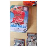 Lot of 9 Baseball and Basketball Cards Featuring Eric Chavez, Tim Hudson, and DeMarcus Cousins and Kirby Puckett Wheaties Box