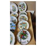 State-themed decorative plates including Ohio, New Mexico, Mississippi, California, Florida, and others