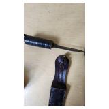 Lot of Knives and Tools Including Buck Knife, Victorinox Swiss Army Knife, and Vintage Fixed Blade