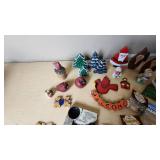Lot of Holiday Decorations and Ornaments including Wooden Figures, Snowmen, and Santa Figures