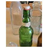 Lot of Assorted Glass Bottles Including Grolsch Bottle with Swing Top