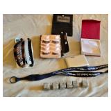 Pocket Juice Portable Charger, Hair Combs, Eyelash Set, Whiskey Stones, and Lanyard