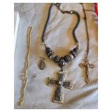 Religious Items Collection including Crosses, Rosaries, and Figurines