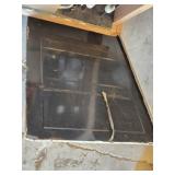 Box Full of Chess Pieces and Metal Chess Board