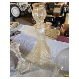 Glassware Collection including Cut Glass Decanter, Large Jug, and Candlestick Holders