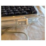 USB-C to Digital AV Multiport Adapter, Wired Keyboard, and Purple Bluetooth Keyboard