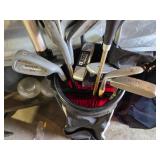 Spalding and Dunlop Golf Club Bags with Various Clubs