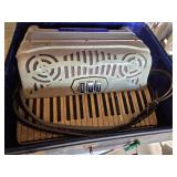 Vintage Venucci Accordion with Case and Sheet Music - Appears in Good Condition