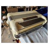 Vintage Venucci Accordion with Case and Sheet Music - Appears in Good Condition