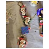 Christmas Ornaments including Handcrafted Glass Snowman, Penguin Couple, Santa Figures, and Decorative Balls