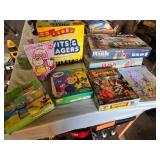 Board games and puzzles including Wits & Wagers, Risk, and Snorta