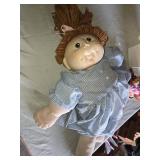 Cabbage Patch Kids Dolls and Accessories Lot including Large Doll, Two Mini Dolls, and Accessories