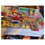 Assorted Vintage Toy Collection Including McGruff Comic Books, Grinch Plush, and Snoopy Toy Set