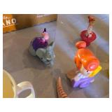 Assorted Vintage Toy Collection Including Flintstones, Dinosaurs, and Puzzle Games