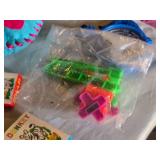 Assorted Vintage Toy Collection Including Flintstones, Dinosaurs, and Puzzle Games