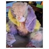 Pastel Plush Bunny, Crocheted Blanket, and Assorted Stuffed Toys