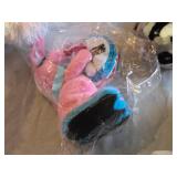 Pastel Plush Bunny, Crocheted Blanket, and Assorted Stuffed Toys