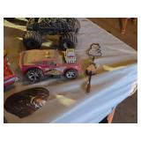 Assorted Toy Vehicles and Accessories Lot including Monster Trucks, Cars, and Tank