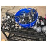 String lights and spotlights in blue bucket