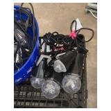 String lights and spotlights in blue bucket