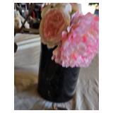 Slow cooker with digital display, baking dish, cutting boards, and floral arrangement