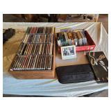 Lot of CDs and DVDs including Ted Nugent, Nazareth, Janis Joplin, Allman Brothers, Frank Sinatra Vegas Box Set, Beastie Boys Anthology, and Classic Rock Collections