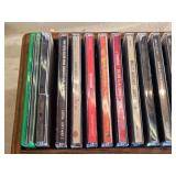 Lot of CDs and DVDs including Ted Nugent, Nazareth, Janis Joplin, Allman Brothers, Frank Sinatra Vegas Box Set, Beastie Boys Anthology, and Classic Rock Collections