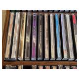 Lot of CDs and DVDs including Ted Nugent, Nazareth, Janis Joplin, Allman Brothers, Frank Sinatra Vegas Box Set, Beastie Boys Anthology, and Classic Rock Collections