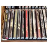 Lot of CDs and DVDs including Ted Nugent, Nazareth, Janis Joplin, Allman Brothers, Frank Sinatra Vegas Box Set, Beastie Boys Anthology, and Classic Rock Collections