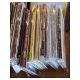 Lot of CDs and DVDs including Ted Nugent, Nazareth, Janis Joplin, Allman Brothers, Frank Sinatra Vegas Box Set, Beastie Boys Anthology, and Classic Rock Collections